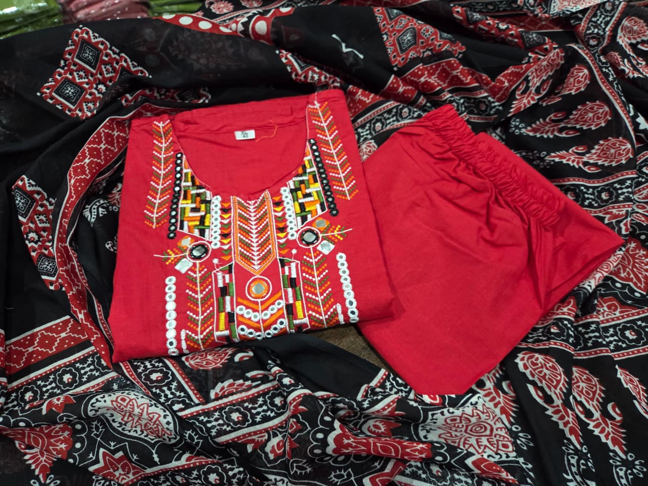 Ignite Your Style with Our Scarlet Embroidered Kurta Set!
