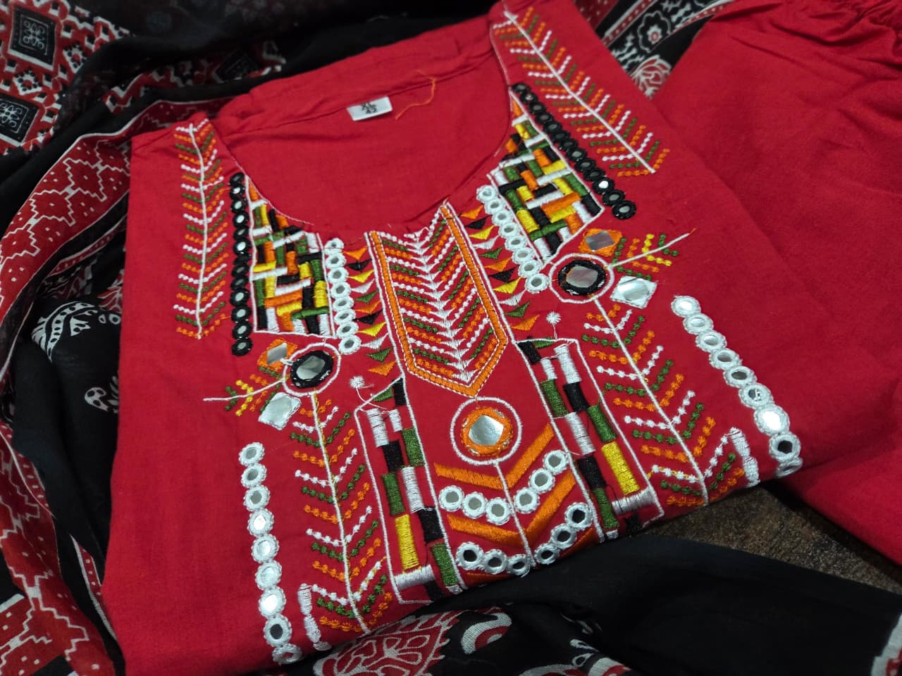 Ignite Your Style with Our Scarlet Embroidered Kurta Set!